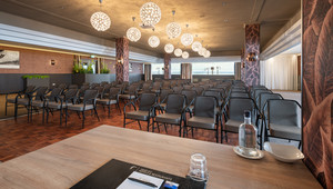 Meeting in spacious theater setting